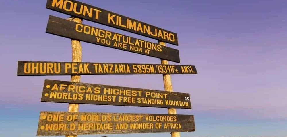 Are Cross-Border Flights Between Kigali and Kilimanjaro or Seronera Included in Standard Packages?